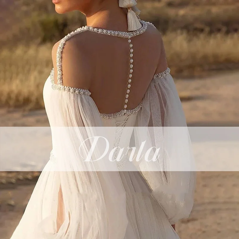 Darla Boho Tulle A-Lineชุดแต่งงานแขนยาวBacklessจีบลูกปัดไข่มุกชุดเจ้าสาวO-คอVestidos De Noviaที่กําหนดเอง