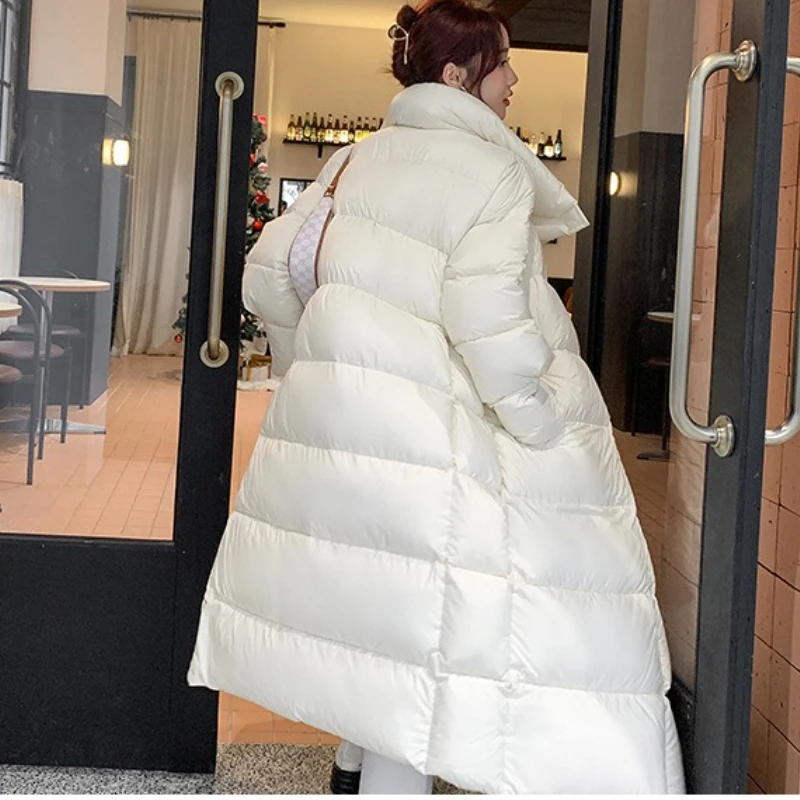 Het lange Koreaanse katoenen gewatteerde jas is verdikt om warm te blijven. Katoenen gewatteerde jas Dames Winter in 2025