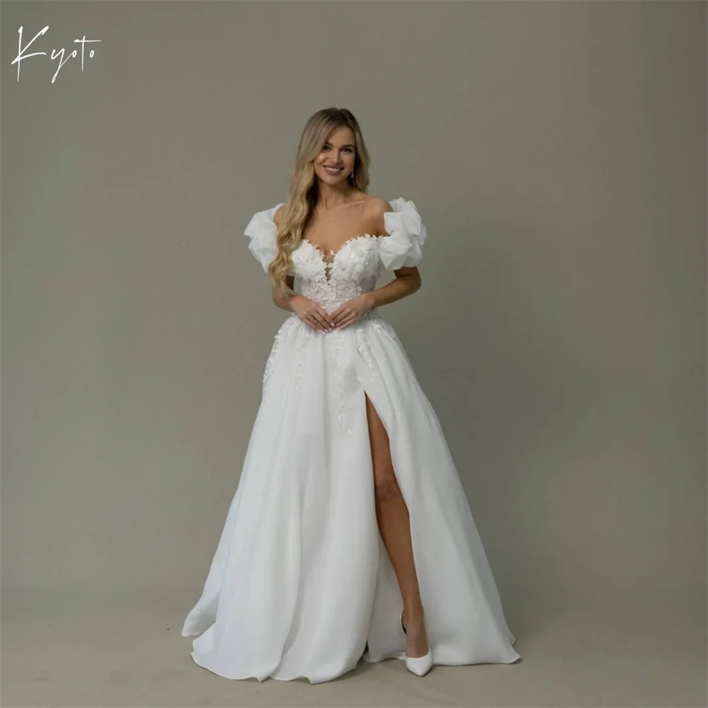 

Kyoto Индивидуальное свадебное платье с пузырьковыми рукавами и бретельками с завязкой на спине и цветочным принтом на талии فستان زفاف длиной до пола Abito da spos