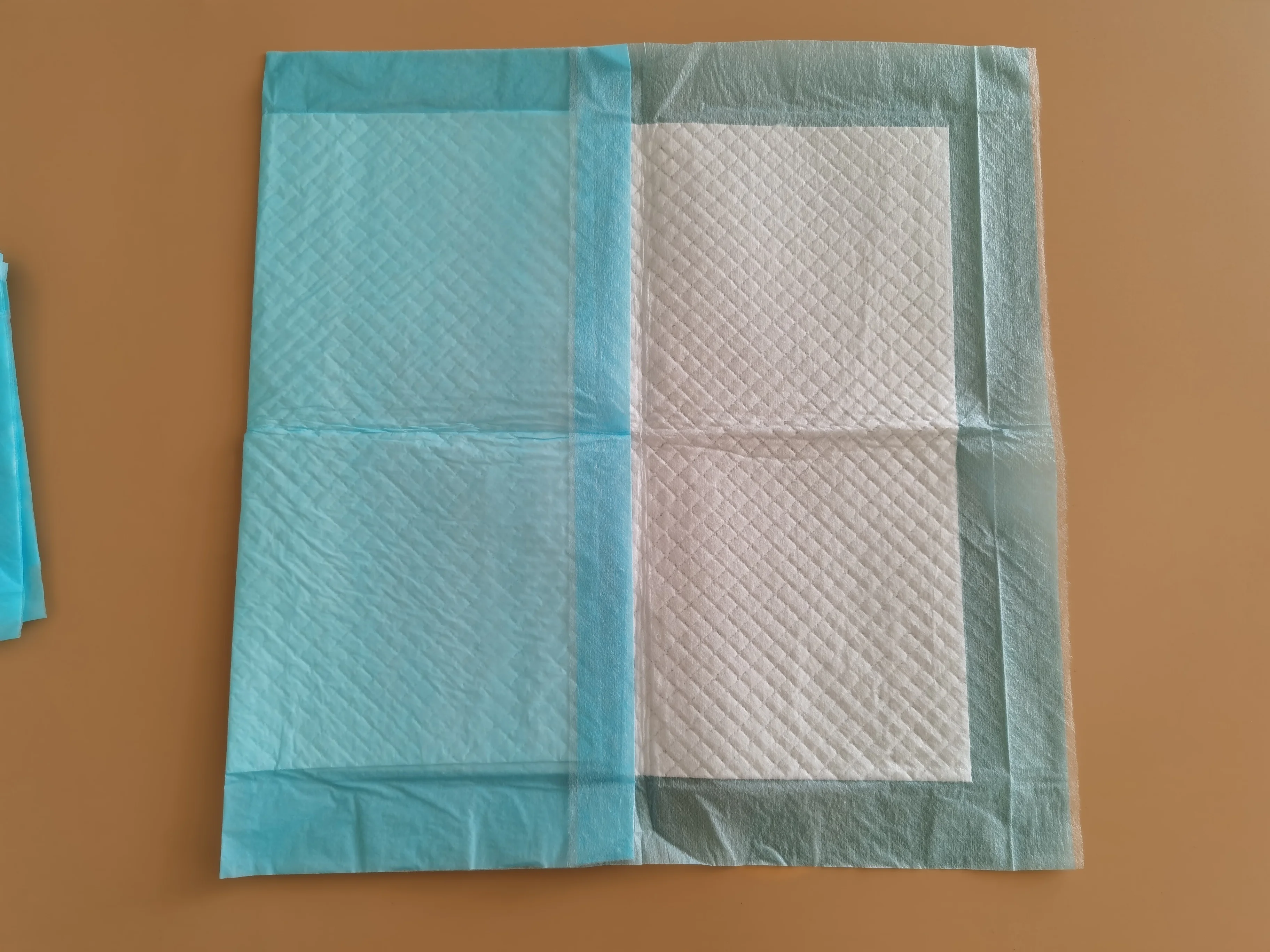 뜨거운 판매 일회용 슈퍼 흡수성 성인 또는 아기 언더 패드 다목적 요양원 기저귀 교환 패드 구강 위생 제품