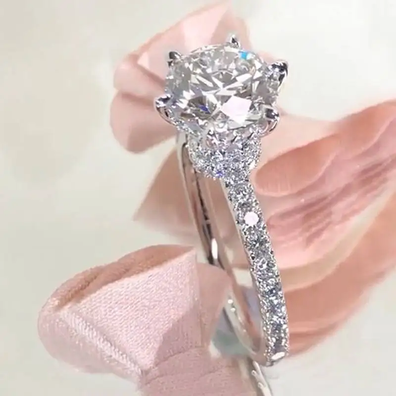Huitan Schlichter Damen-Ring mit Krappenfassung, Design mit funkelndem Zirkonia, elegante Hochzeitsaccessoires, Jahrestag, Schmuck, Geschenk