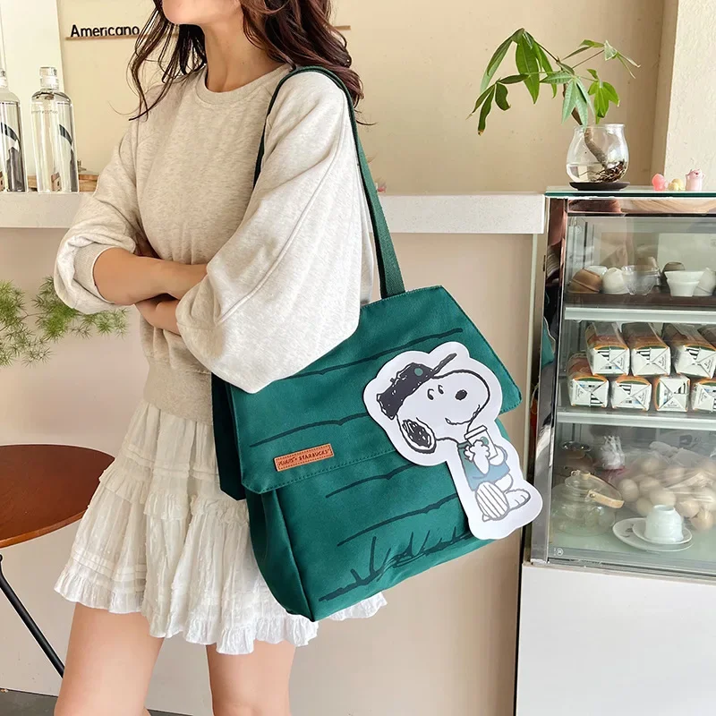 MINISO جديد الكرتون لطيف سنوبي سعة كبيرة مطبوعة حقيبة قماش قنب عادية الطازجة ركاب حمل حقيبة طالب واحد الكتف حقيبة اليد