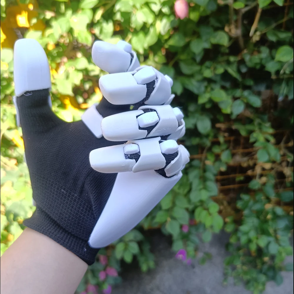 Les gants mécaniques, fabriqués en matériau PETG imprimé en 3D, sont flexibles et ont un look hautement mécanique. Convient pour le cosplay.