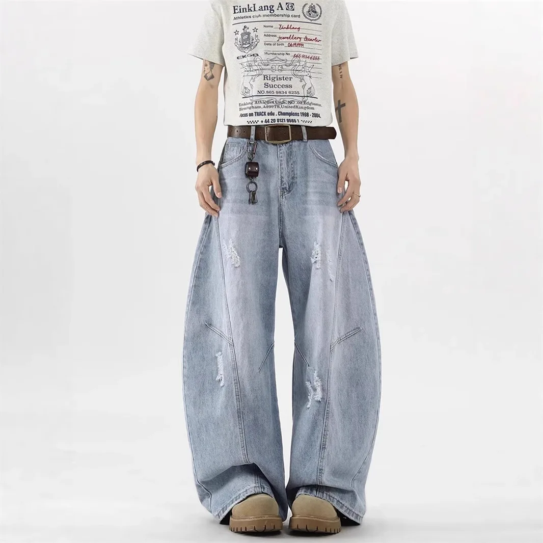 Deconstructed ripped scimitar jeans for men and women in spring high street handsome cleanfit silhouette straight casual pants