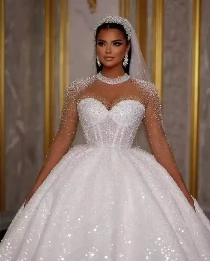 Flavinke Abiti da sposa africani scintillanti personalizzati Abito da ballo Perline glitterate Paillettes Maniche lunghe Abito da sposa sexy Dubai
