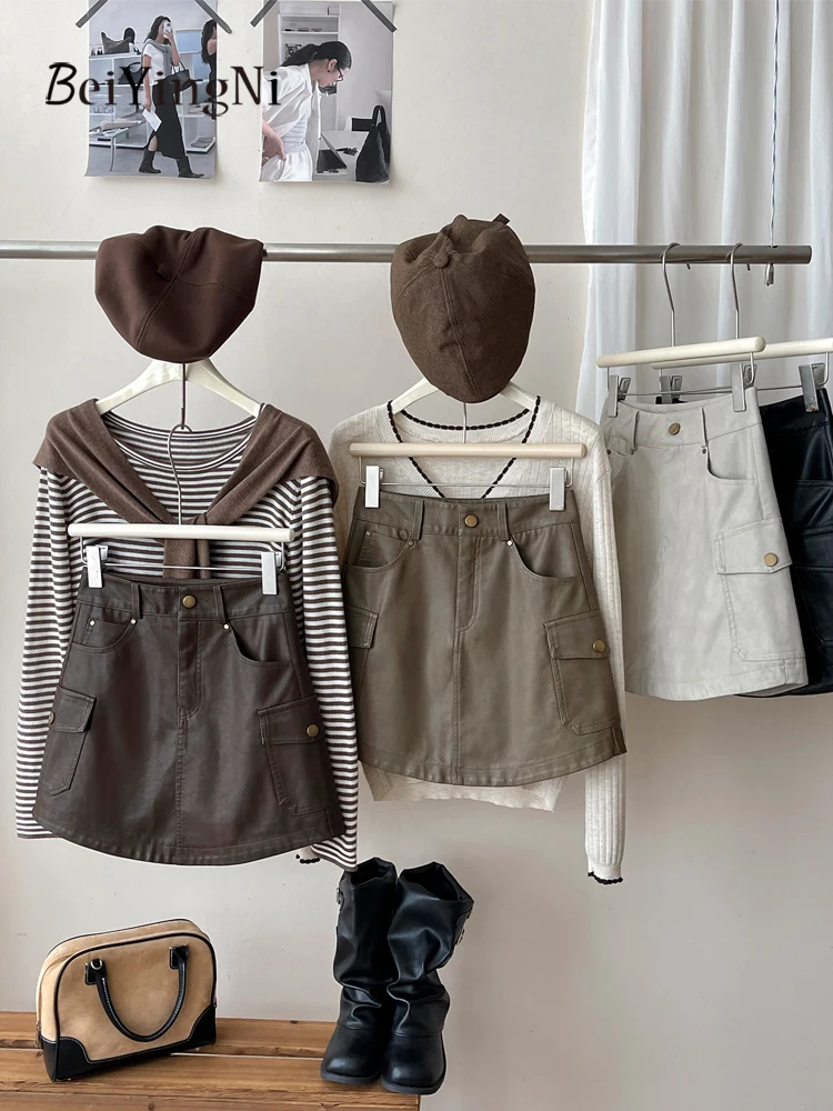Beiyingni Amerikanischen Stil PU Leder Mini Rock Frauen Vintage Harajuku Hohe Taille A-line Cargo Röcke Damen Casual Straße Faldas