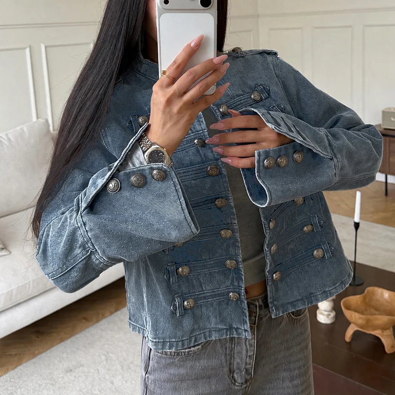 Original blue jacket worn over a black top