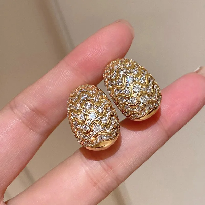 

Light luxury wave full set zircon ear buckle for women, light luxury temperament, versatile commuting accessory