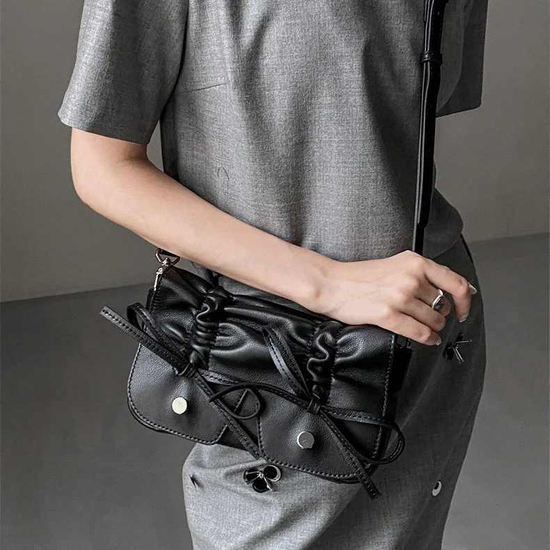 

Stylish Leather Shoulder Bag with Drawstring