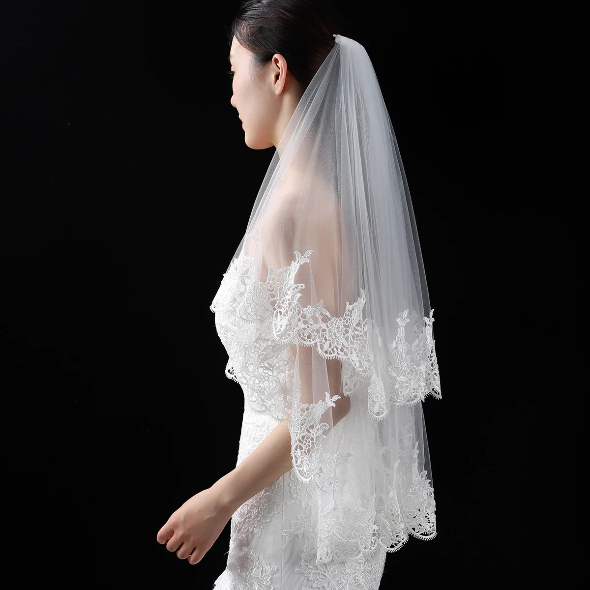 white elegant bride's veil with lace decoration, suitable for women's wedding waist length veils