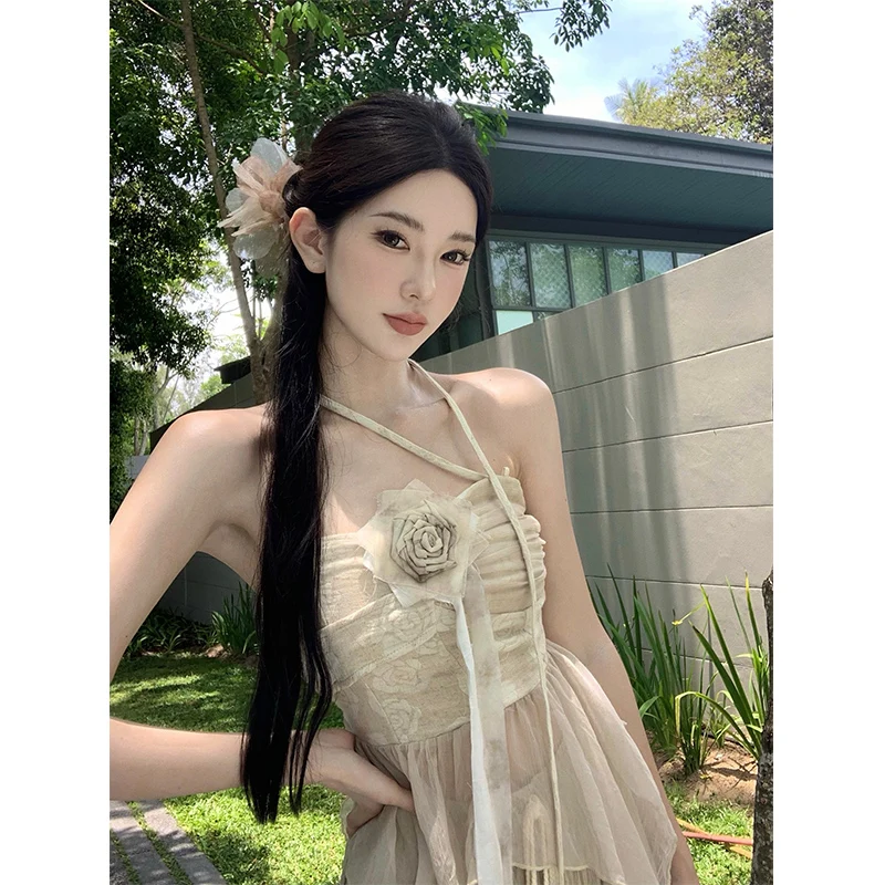 Completo estivo da donna in cotone e lino con top a fascia, pantaloni a gamba larga con nappe e gonna a vita alta in poliestere...