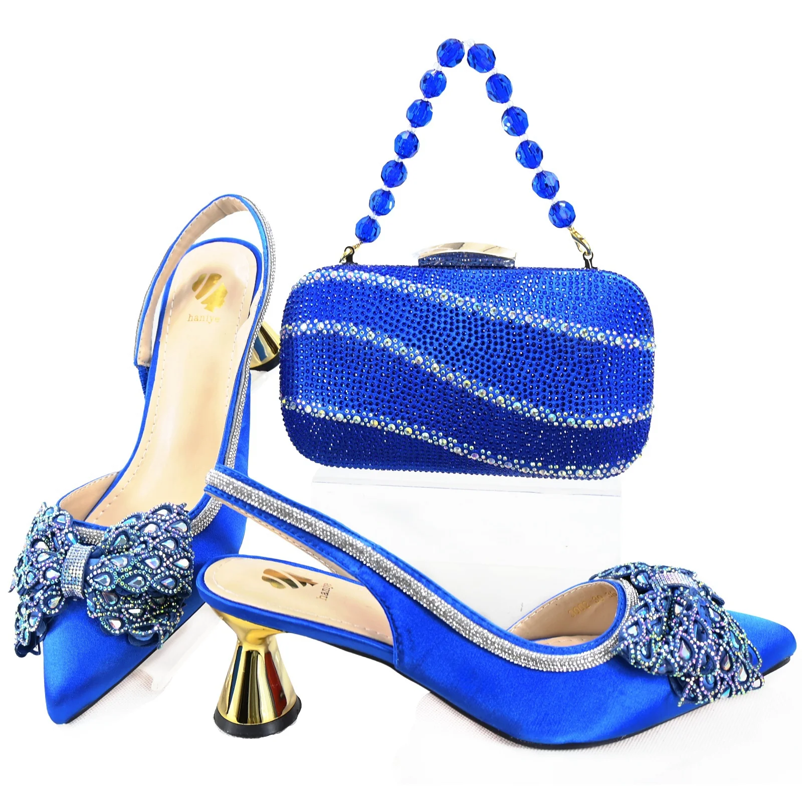 

Комплект обуви и сумки на высоком каблуке синего цвета итальянского дизайна, украшенный стразами, элегантный острый носок с открытой пяткой