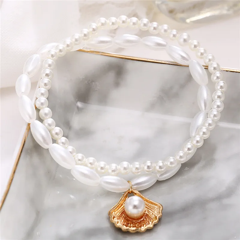 Modyle New Fashion Bohemian Simulated Pearl Chain Wedding Anklet Bracelet for Women Gold Color Shell Pendant Anklet Jewelry Gift