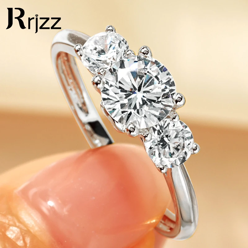 

Rrjzz Sparking Three Stone Round Moissanite Zircon Women Rings 925 Pure Silver Engagement Ring Wedding Anniversary Fine Jewelry