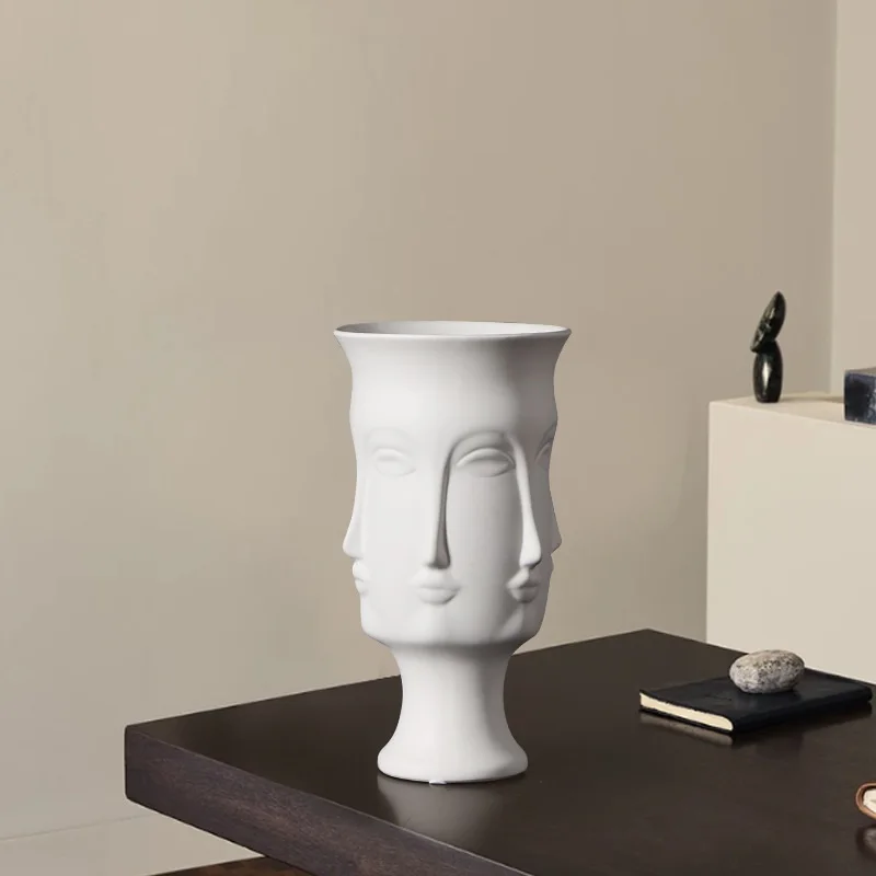 

American light luxury, personality, creativity, human face, white ceramic vase, artwork, light decoration