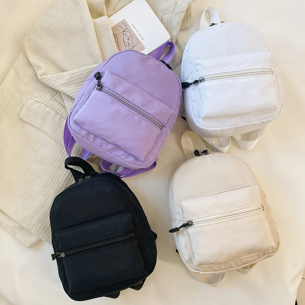 

Fashionable solid color women's classic nylon backpack style mini backpack