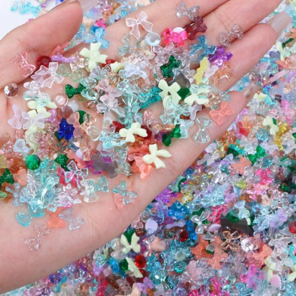50g 3D zufällige gemischte Harz Schleife/Diamant Nail Art Charms Cartoon Formen Herz/Blume/Band Strass niedlich DIY Maniküre Zubehör – Detail 10