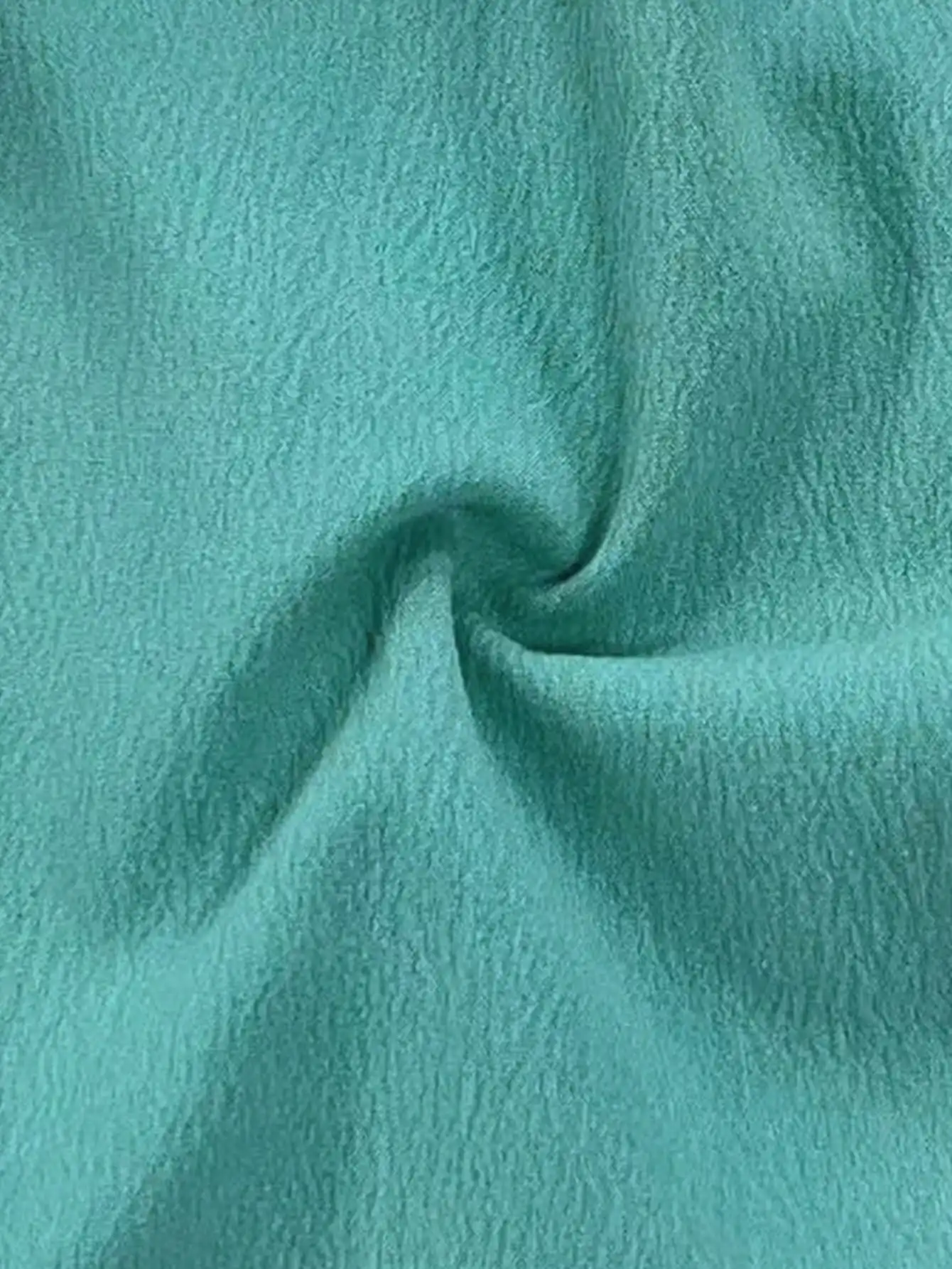 ชุดเซ็ตเสื้อครอปตัวสั้นสีเทอร์ควอยซ์แบบเว้า 2 ชิ้นสำหรับผู้หญิง และกางเกงขายาวเอวสูงทรงขากว้าง