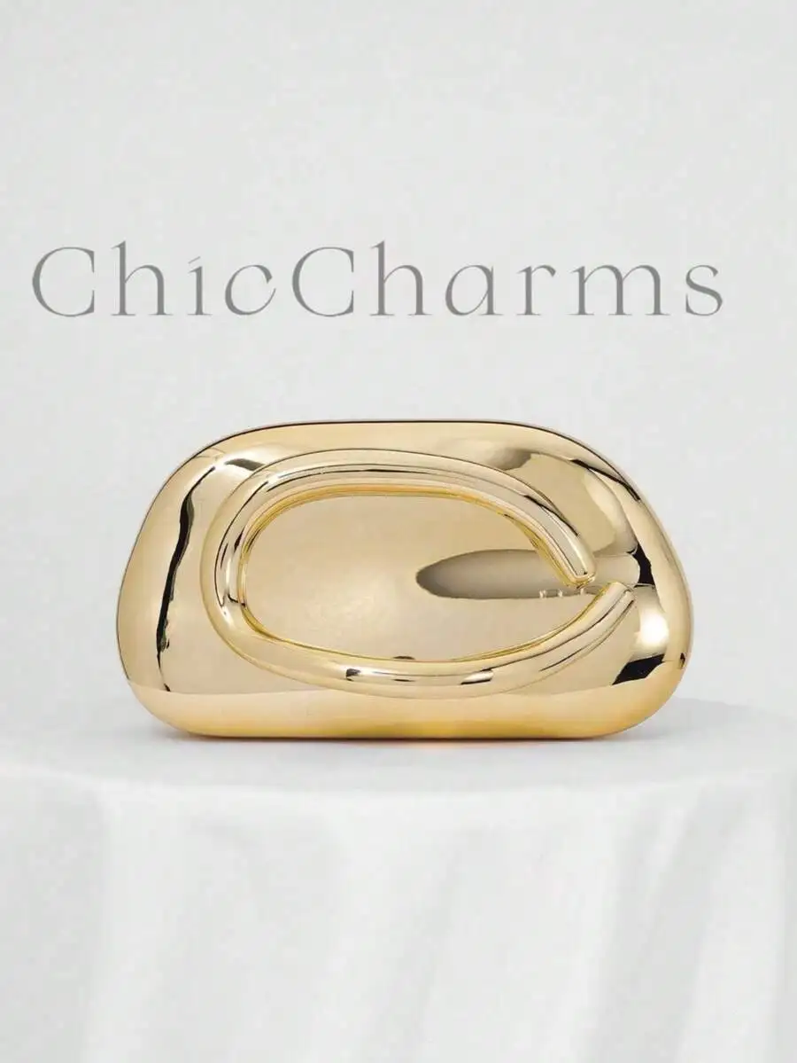 

Золотистая металлическая скульптурная сумочка-клатч для вечерних торжественных мероприятий