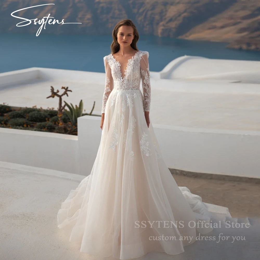 

SSYTENS Luxury Wedding Dresses 2026 Lace Applique Illusion Long Sleeves Sexy Backless Bridal Gowns Floor Length Brides Dresses
