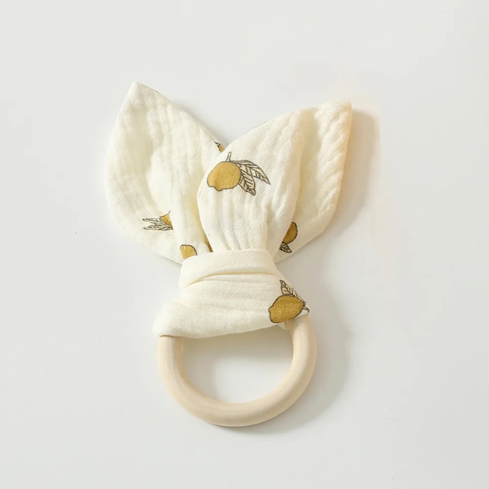 

Soft Baby Wooden Hand Grasp Toy Natural Wooden Rabbit Ears Newborn Teething Ring Bracelet Rattle Sensory Toy Chewing Appease Toy