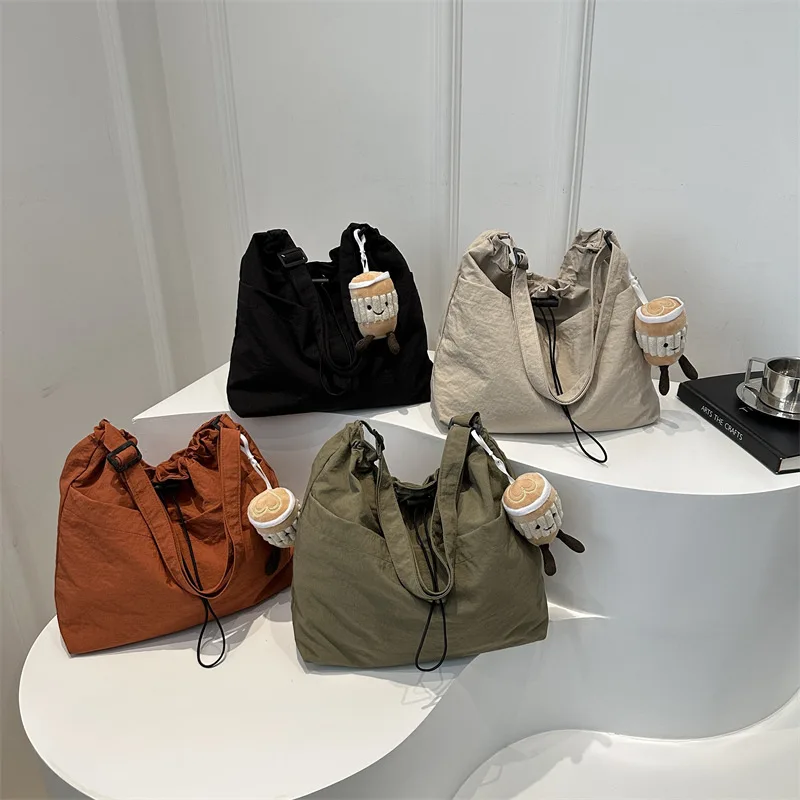 

Large-capacity Drawstring Bucket Bag for Women 2024 New Japanese Style Ins Casual Crossbody Bag Street Shoulder Commuter Bag