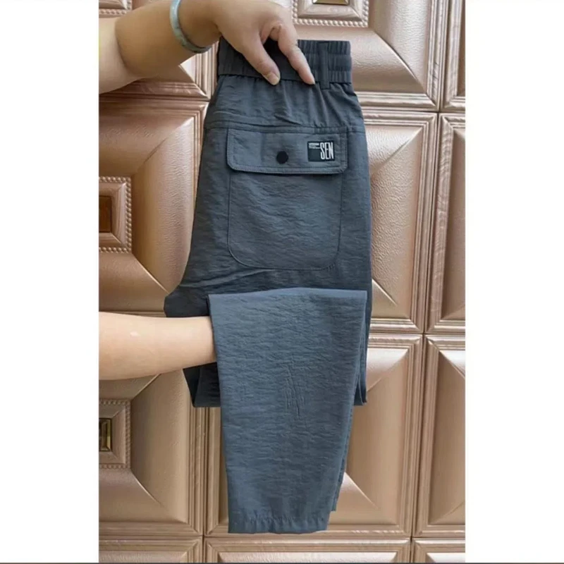 Spring Autumn Fashion Solid Color Elastic Waist Pockets Men\'s Clothing Loose Casual Thin European Style Simplicity Haren Pants