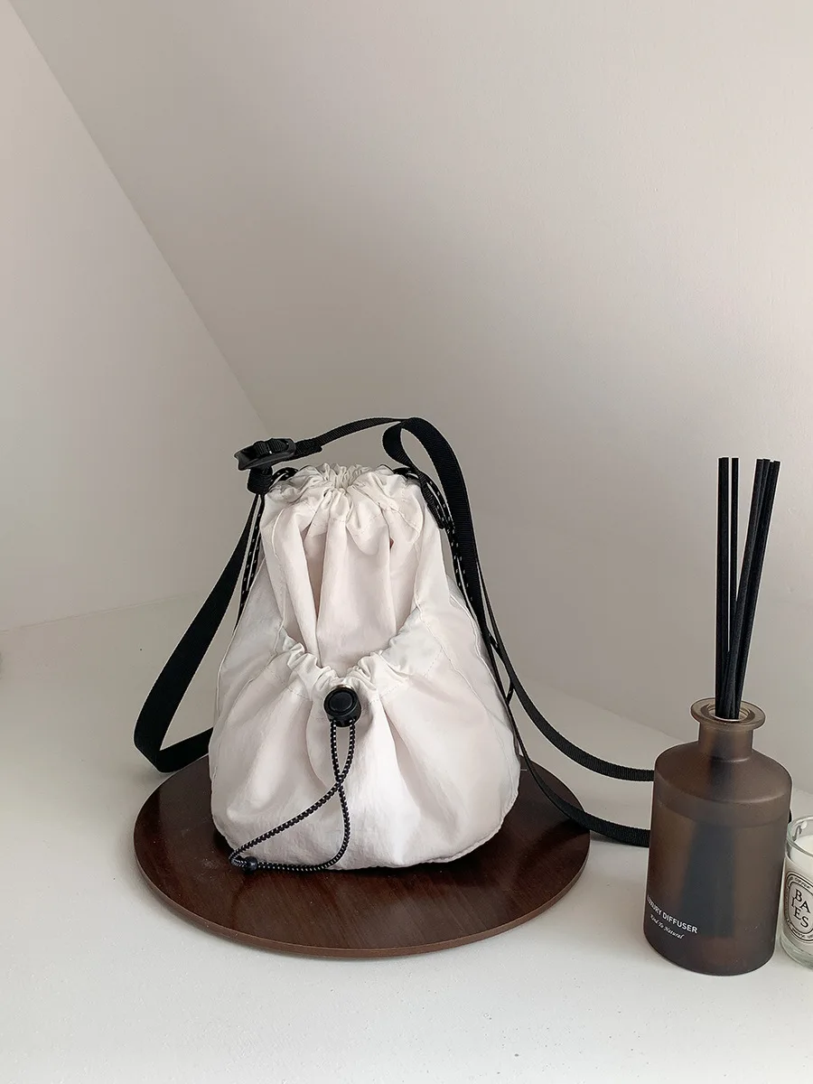 New nylon crossbody bucket bag for women casual trend shoulder bag design pull rope fold bag for women