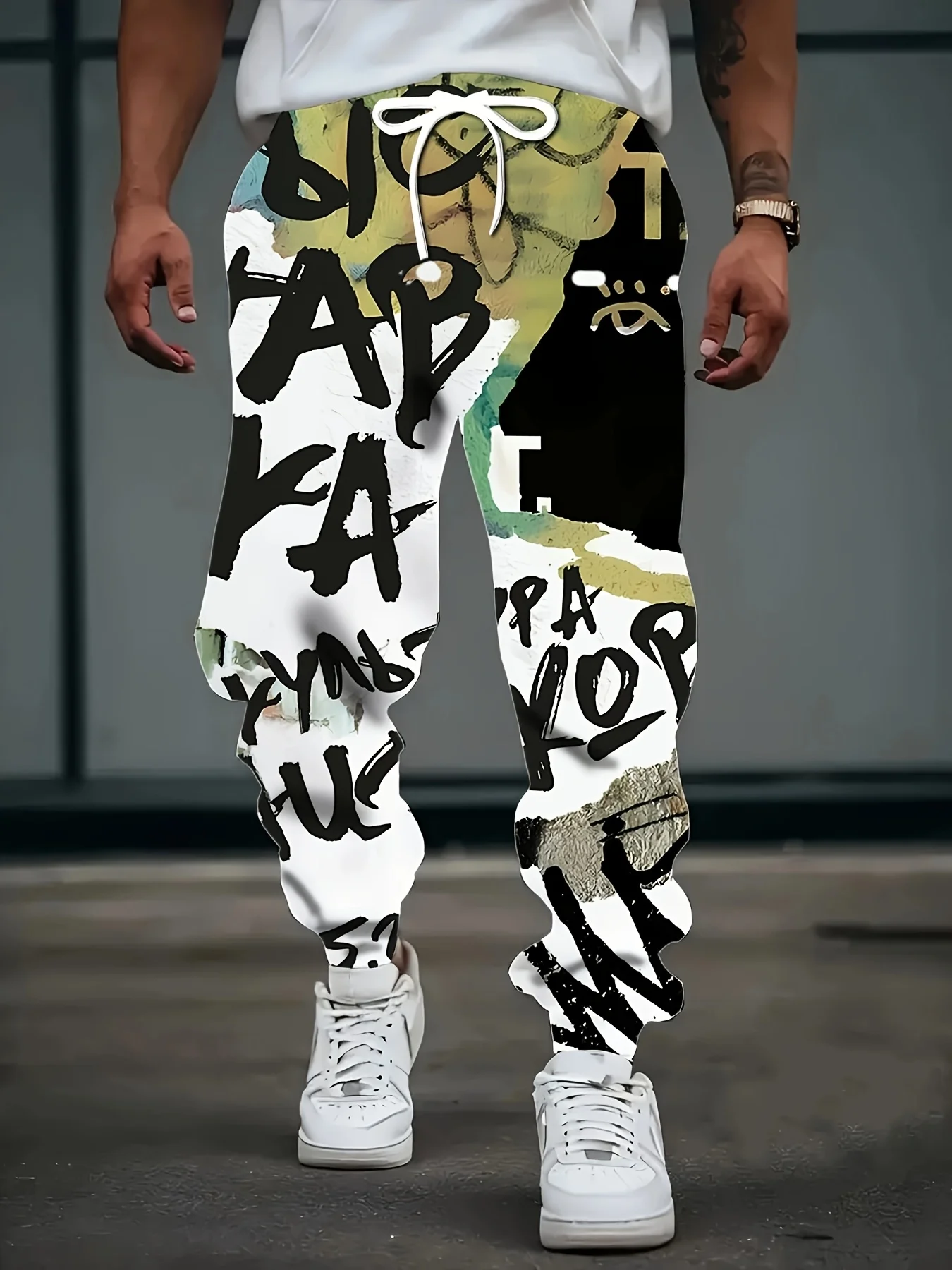 

The 2025 autumn new men's long pants feature casual roller skating fashionable 3D graffiti letter printing and comfort