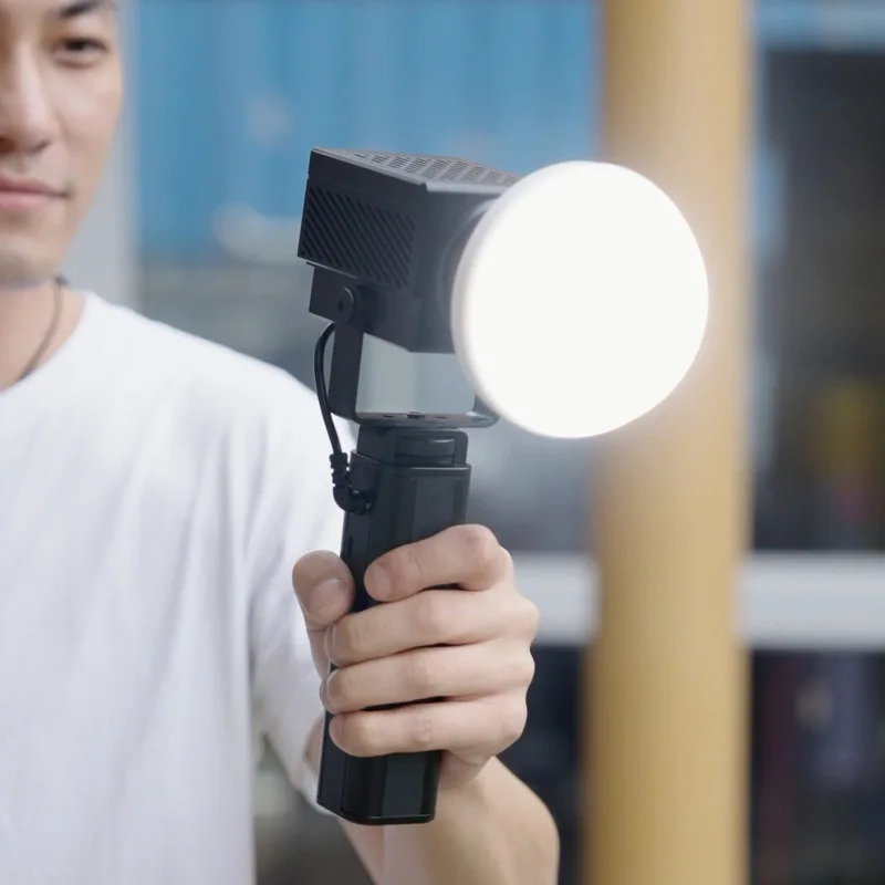 ไฟลบเงาแบบมือถือ2700K-7500K ไฟ RGB ขนาด60วัตต์ขนาดเล็กแบบพกพาไฟสตูดิโอสำหรับถ่ายภาพวิดีโอของกล้อง