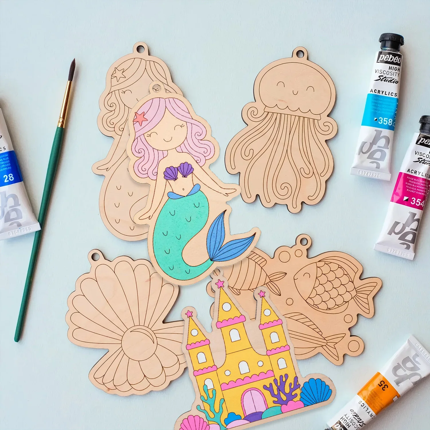 16 piezas de adornos de madera con temática submarina, figuras de dibujos animados de peces/sirenas/conchas, manualidades colgantes en blanco para decoración de fiestas oceánicas, suministros de manualidades de Año Nuevo