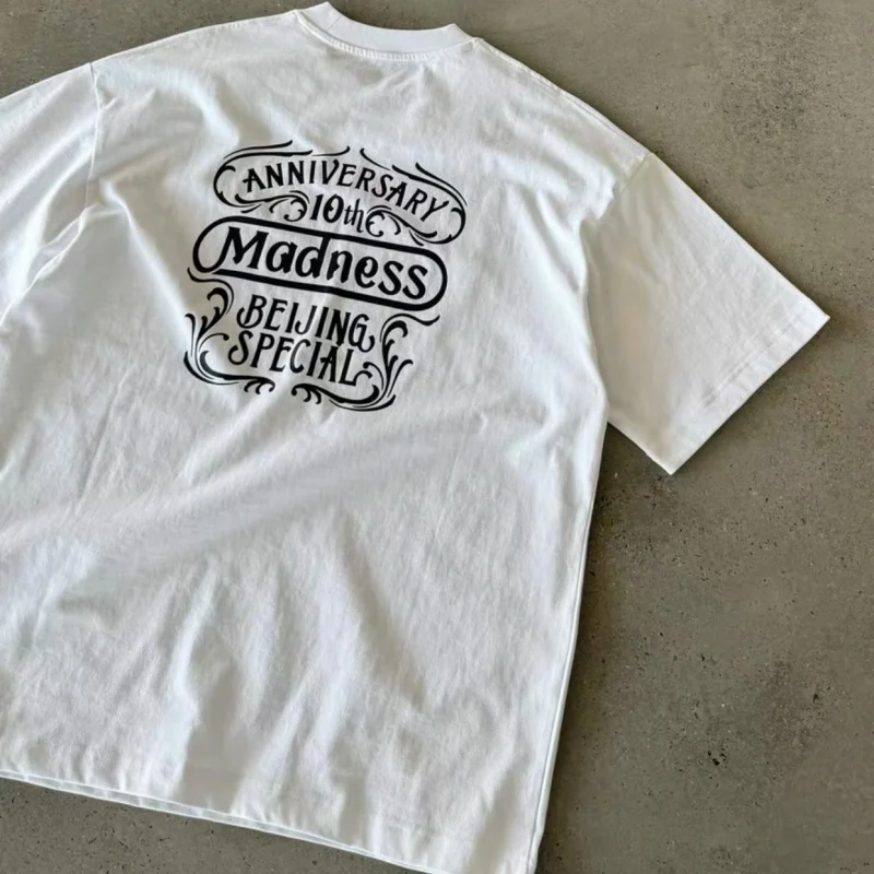 

Artistic Letter Print White Round Neck Loose Madness Tshirt High Quality Cotton Short Sleeve Summer Men Women Street Cleanfit