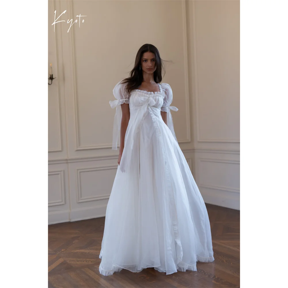 

Kyoto Customized Puff Sleeve Ball Gown Tulle Wedding Dress Ruffled Bow High Waist فستان زفاف Sweep Train Robe de mariée