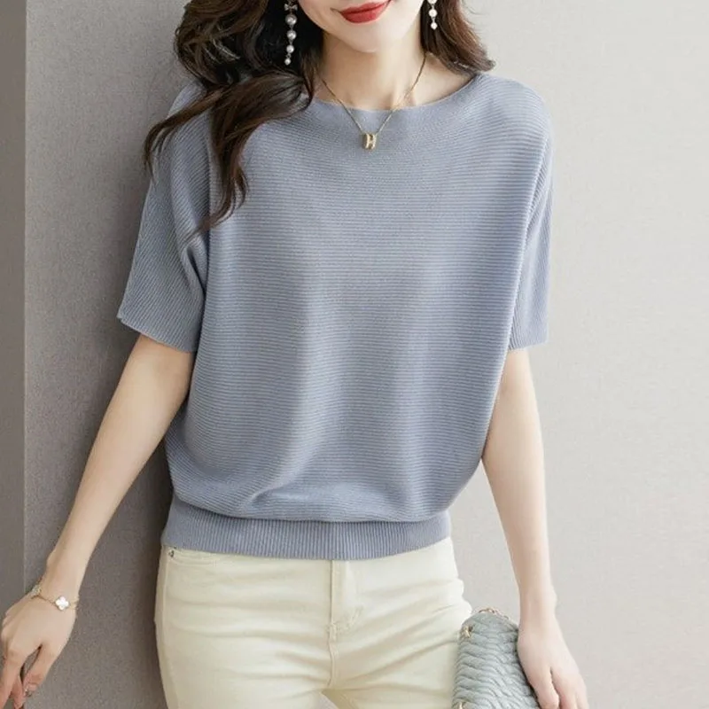 

Новый женский вязаный свитер-пуловер черного цвета с коротким рукавом, трикотажный топ с круглым вырезом Q3105