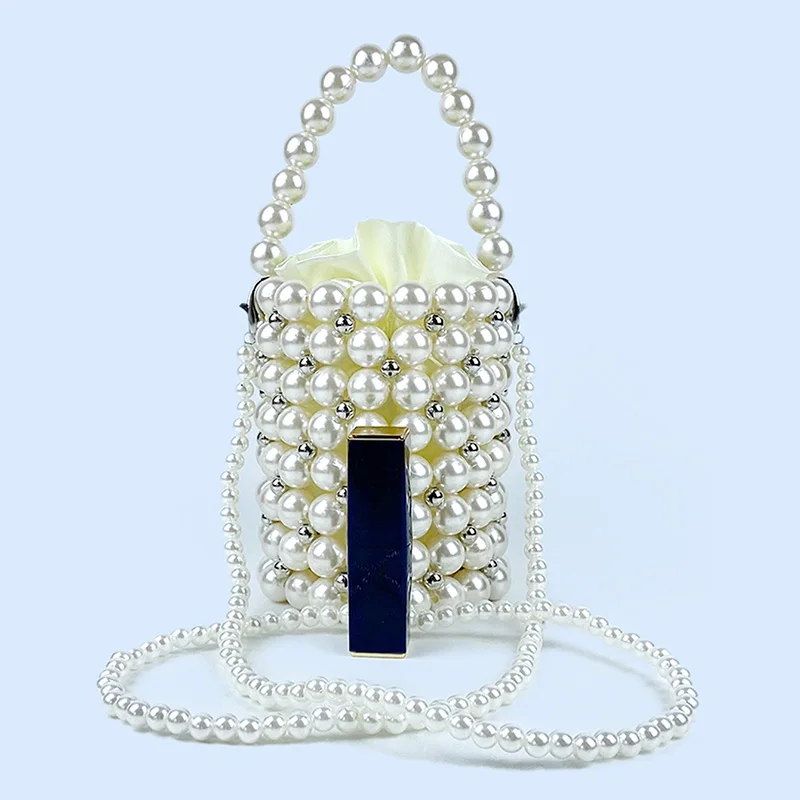 Hollow handmade woven beaded pearl bag, round bucket bag, hand-held fairy bag, paired with skirt small bag