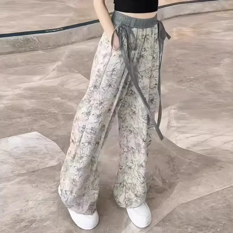 Pantaloni casual dritti larghi drappeggiati a vita alta sottili estivi da donna a gamba larga in chiffon con fiori d'inchiostro