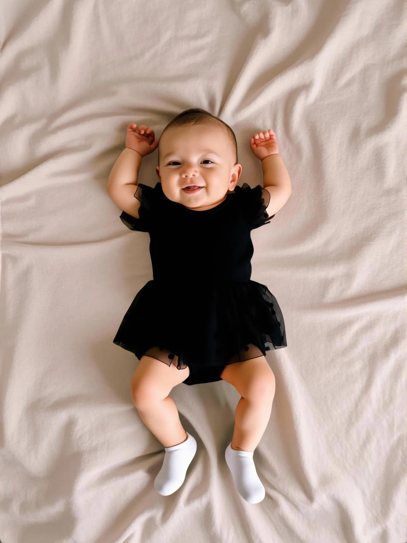 Elegant polka dot chiffon fabric with flying sleeves and A-line skirt for baby girl suitable for parties and vacations in summer