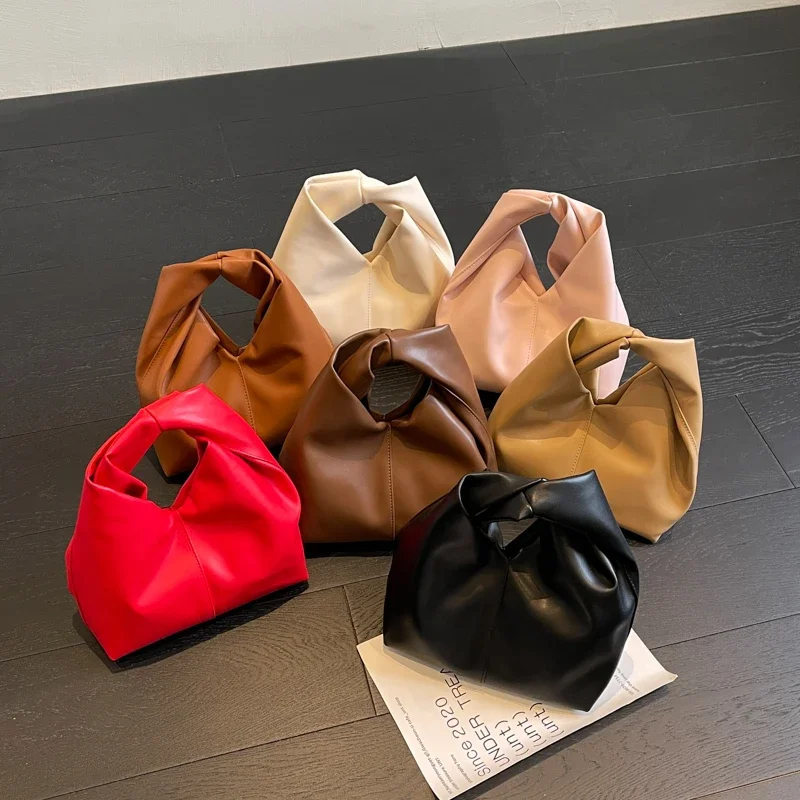 

Stylish twist square bag, solid color top clutch bag, simple and versatile commut