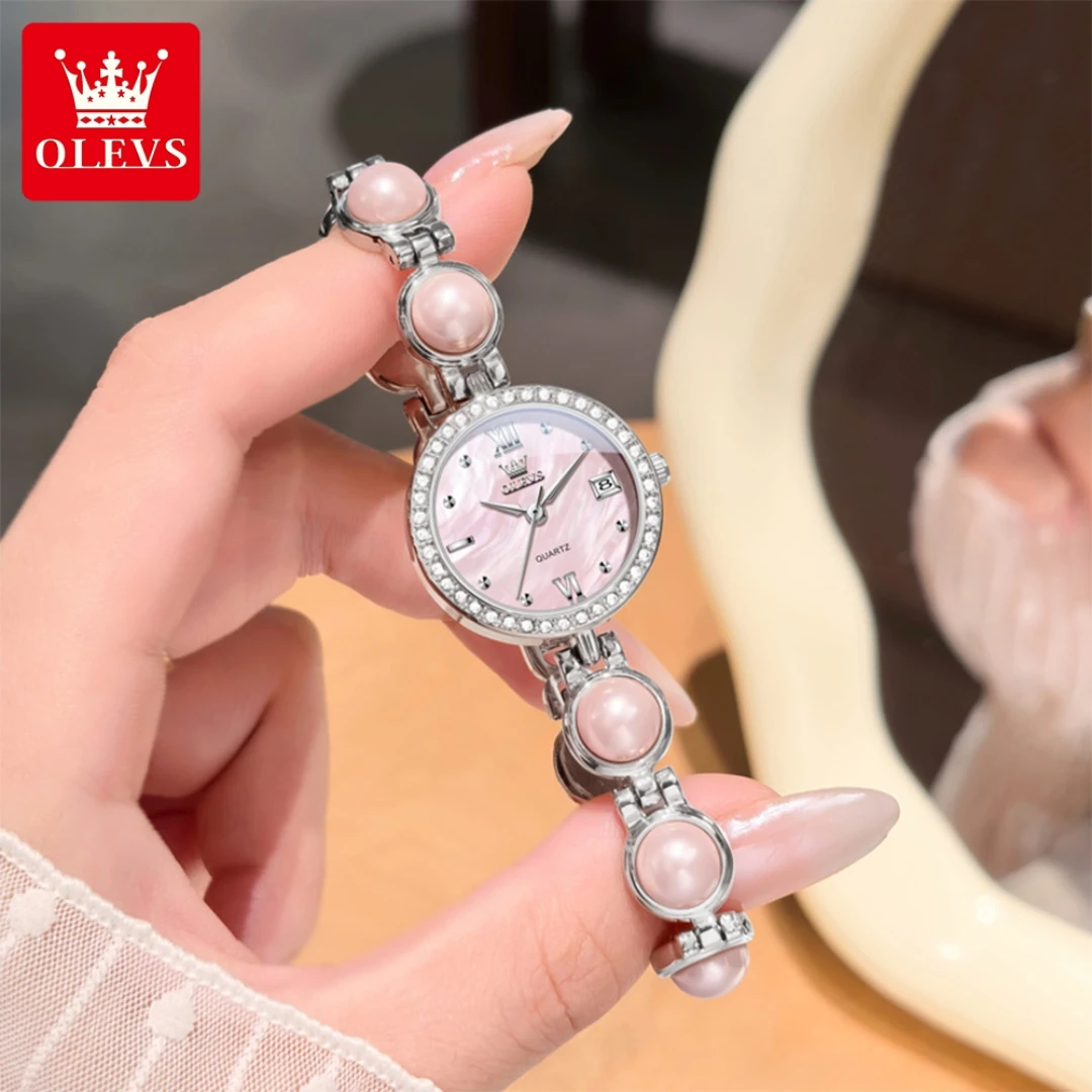 ساعة OLEVS 5669 كوارتز عصرية هدية من الفولاذ المقاوم للصدأ وحزام ساعة يد دائري بتقويم
