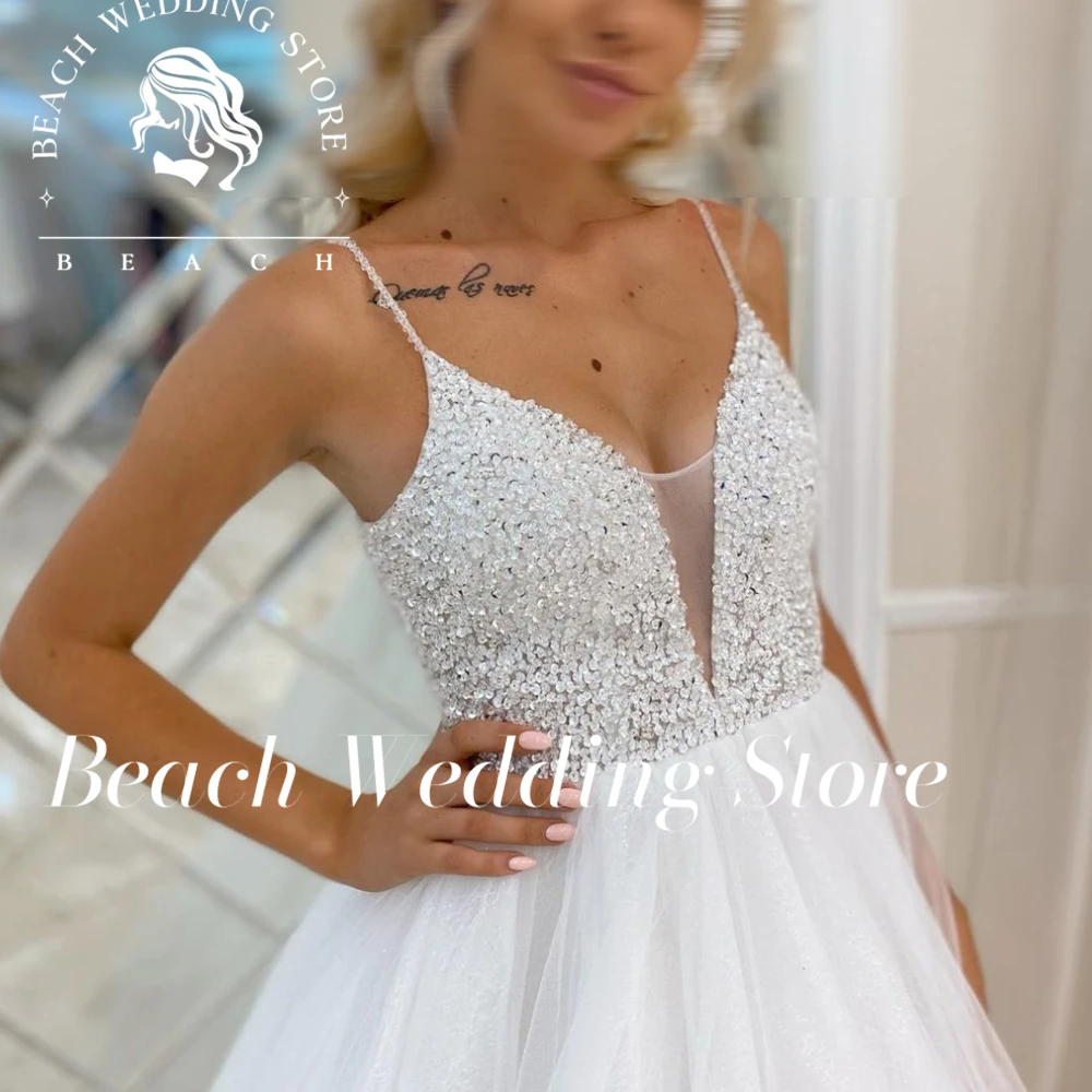 

Beach Customized Vintage Wedding Dress Sweetheart Spaghetti Strap A-Line A-Line Organza Backless Charming Robe De Mariee Shinny