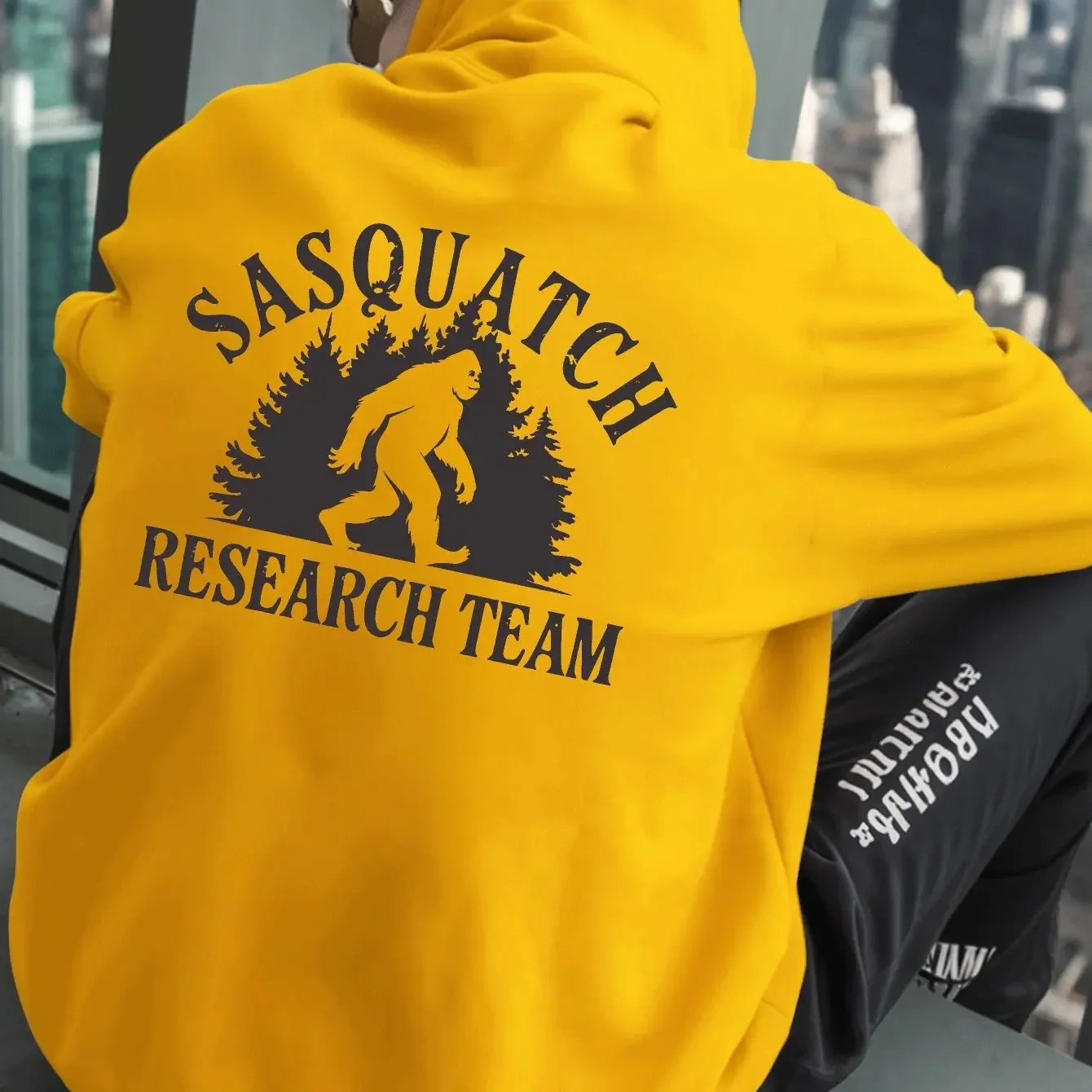 Men Solid Black Oversized Hoodie Vintage Worn Letter Sasquatch Bigfoot Forest Research Team Back Graphic Camping Sweatshirt