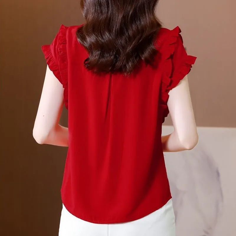 Elegante moda Solid Ruffles Button Shirt estate 2024 New Peter Pan Collar manica corta Slim pullover camicetta abbigliamento donna