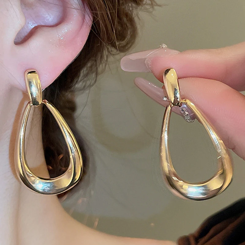 

Fashionable and Versatile Metal Hollow Water Drop Ear Cuffs Simple and High-quality Earrings for Women New Ear Hoops