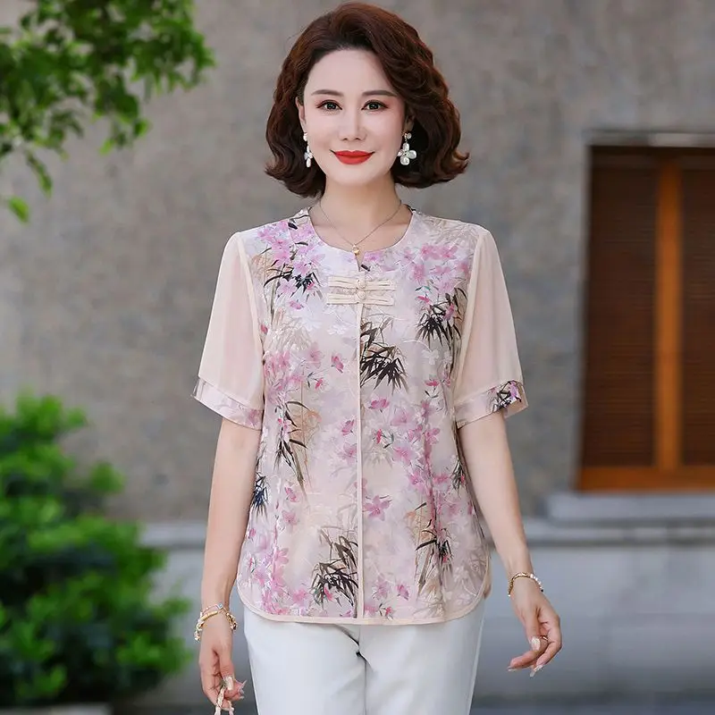 Damska koszulka z krótkim rękawem w nowym stylu, łączona, z okrągłym dekoltem, zapinana na guziki, modna, z nadrukiem, nowy chiński top