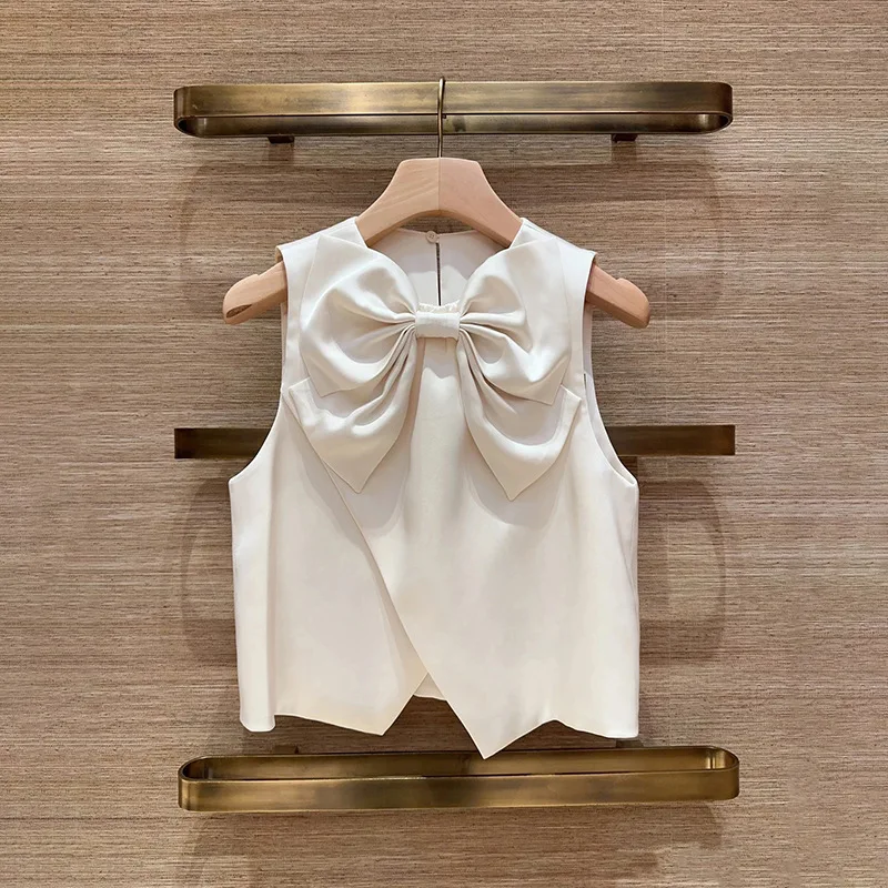 

【Подарок бесплатно】2026 Ранняя весна Элегантный женский атласный топ без рукавов с большим бантом и круглым вырезом Однотонная блузка