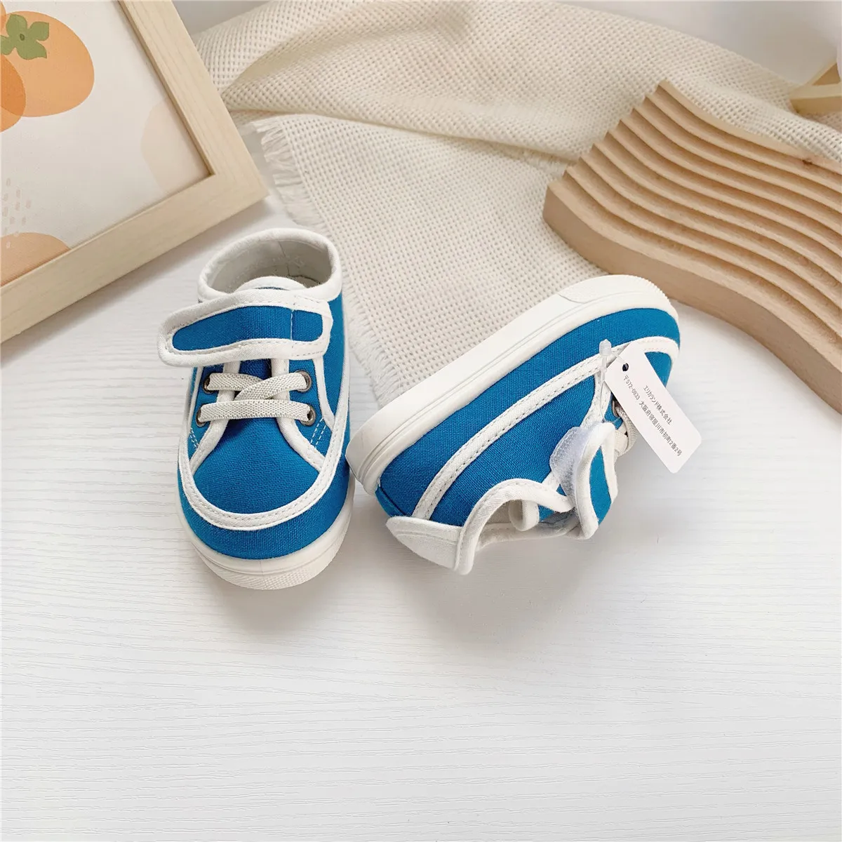 2025 japonés único nuevo producto Color sólido lindo AB bebé suela suave zapatos para caminar bordado zapatos casuales de tela para niños