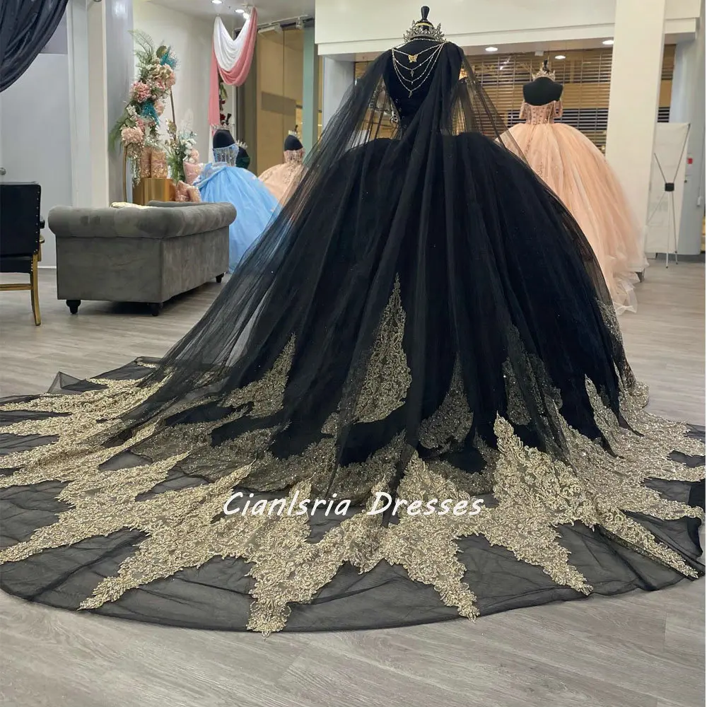 Black Spaghetti Straps Illusion Ball Gown Quinceanera Dresses With Cape Gold Appliques Lace Beading Corset Vestidos De 15 Años