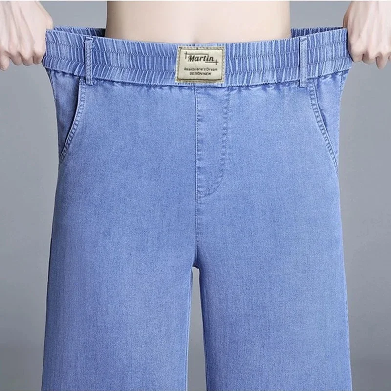 Jeans de seda gelo feminino, jeans azul fino, calças largas, calças elásticas de cintura alta estendidas, calças de vaqueira, verão