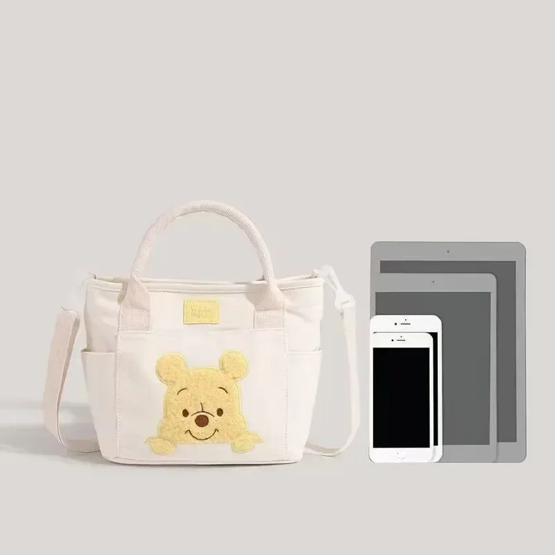 2024 New Disney Cute Cartoon Winnie the Pooh Canvas Crossbody Bag Doll Portable Handheld Crossbody Two-Purpose Bag