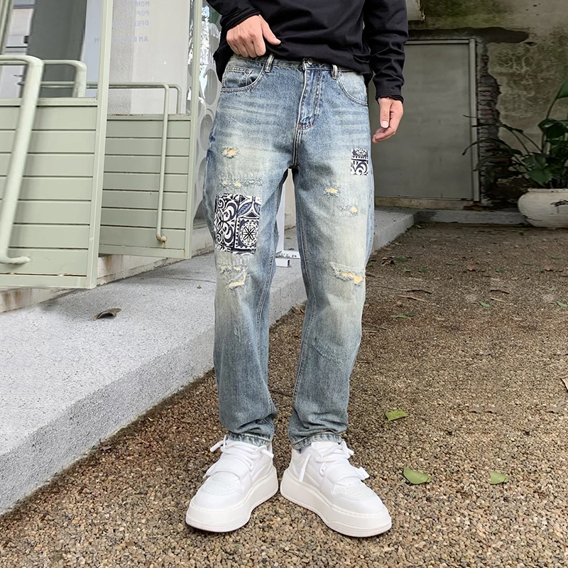 

New high-end and fashionable tapered jeans for MEN'S FASHION brand loose scratched torn harem pants